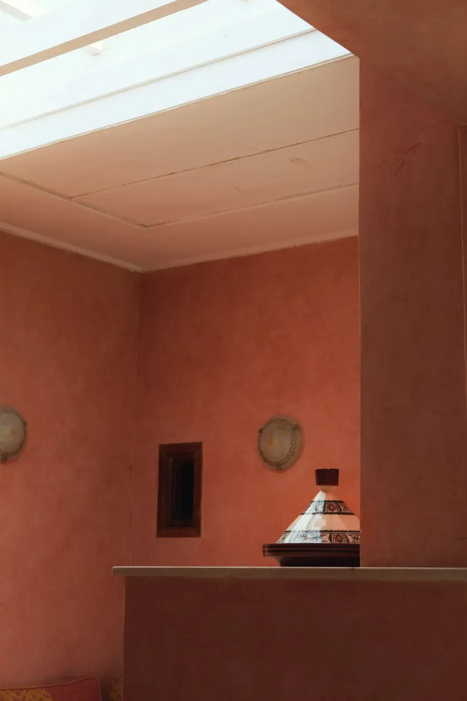 Terracotta textured wall finish with a tajine